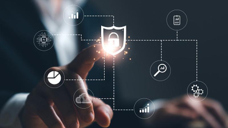 Man using network internet on laptop computer with lock protect virus icon